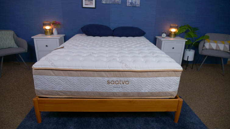 The Saatva Rx mattress staged in a Sleepopolis studio